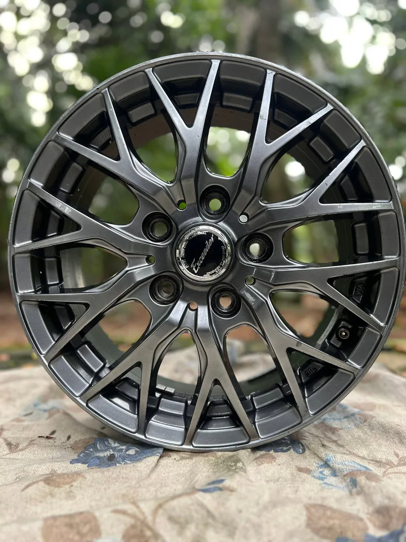 Front view of a 15-inch Japanese Exceeder multi-spoke alloy wheel