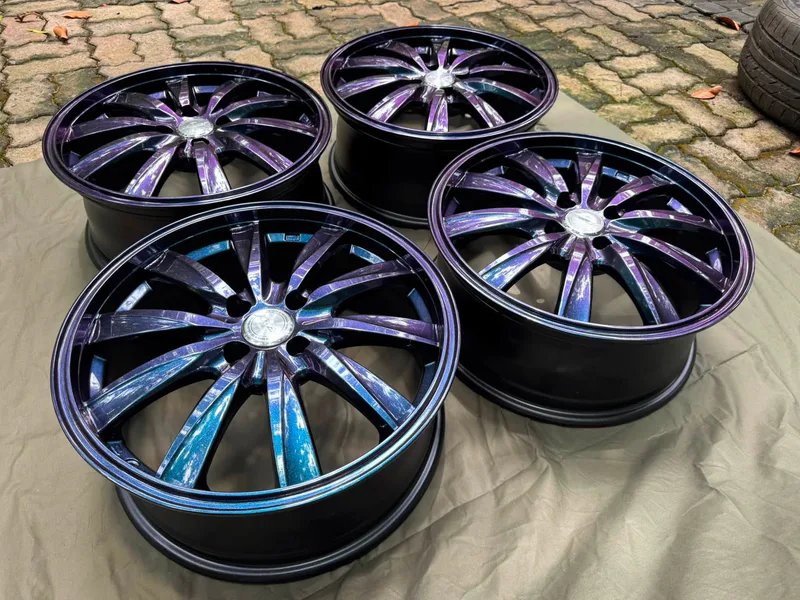 A complete set of WEDS Leonis wheels restored by Ceylon Chrome in a chameleon colour-shift finish